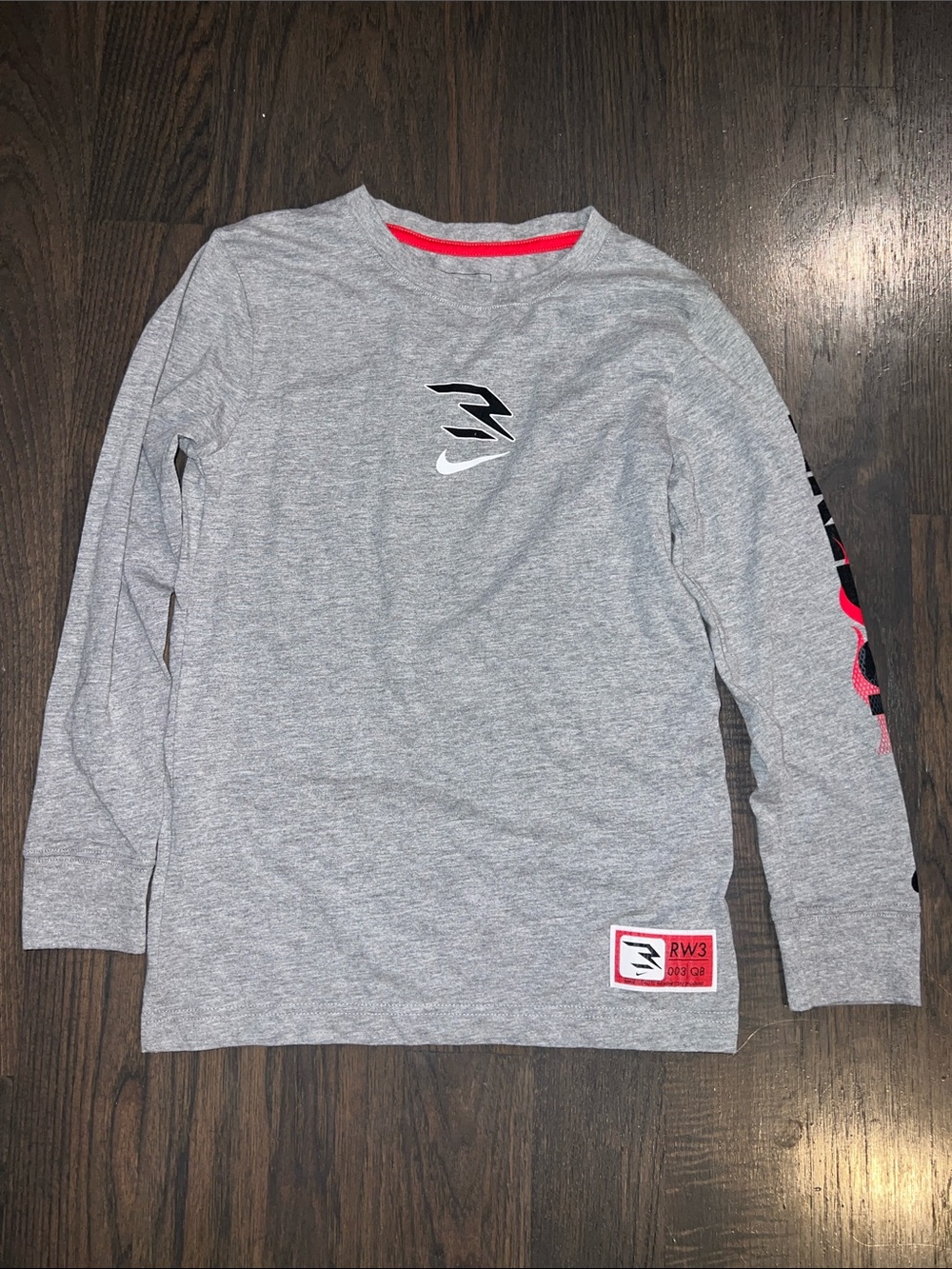 Nike Gray Long-Sleeve Kids' Graphic Tee with Red Trim Size M